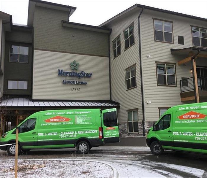 SERVPRO trucks outside of a commercial property