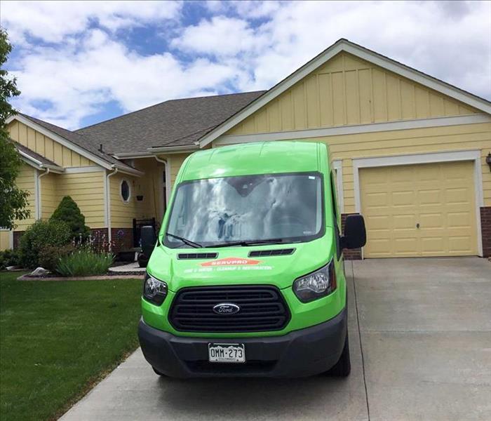 SERVPRO truck in front of a Brighton, CO home