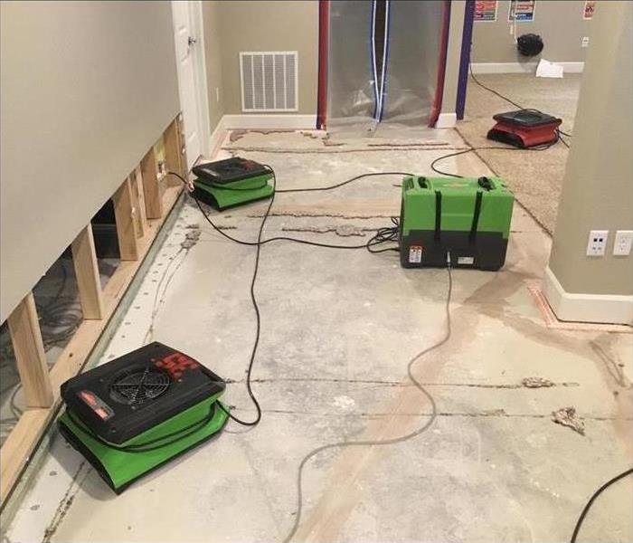 air movers placed on affected area, flood cuts. Concept water damage