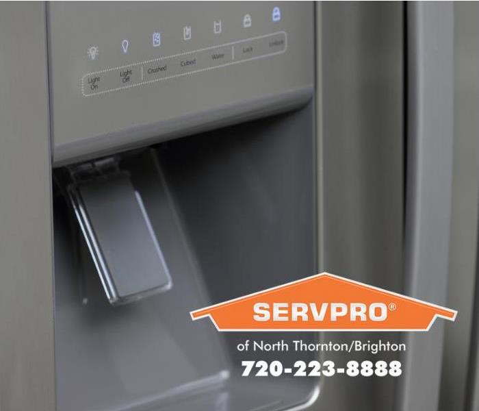 A refrigerator with an icemaker option on the front door is shown. 